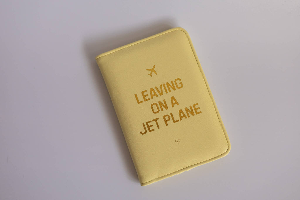 Leaving On A Jet Plane Passport Cover Wallet Pastel Yellow